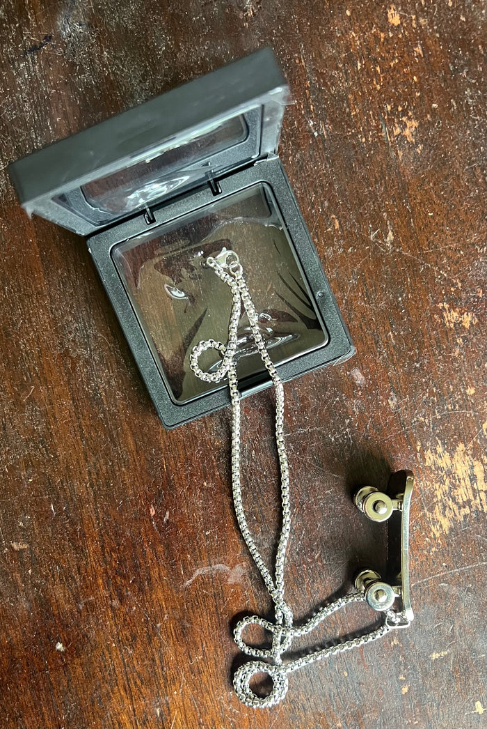 BANNED Silver Metal Skateboard Necklace