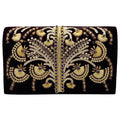 A purple velvet clutch with gold beadwork and embroidery, featuring a removable gold-toned chain shoulder strap.