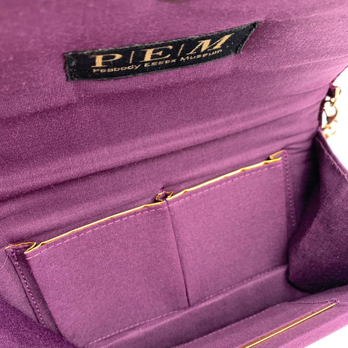 Interior shop of a purple handbag.