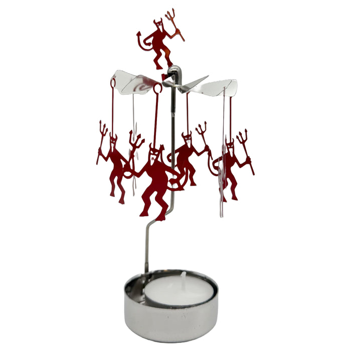 Decorative candle holder with red figurines on a white background