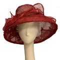 Whimsical red hat on a mannequin head