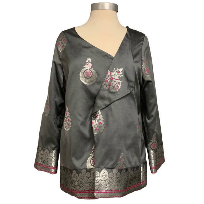 Long sleeve jacket with bird and floral motifs in silver and gray on a mannequin against a plain background.