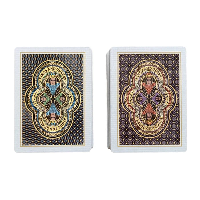 Two stacks of playing cards with Ethiopian-inspired artwork on a colorful geometric background.