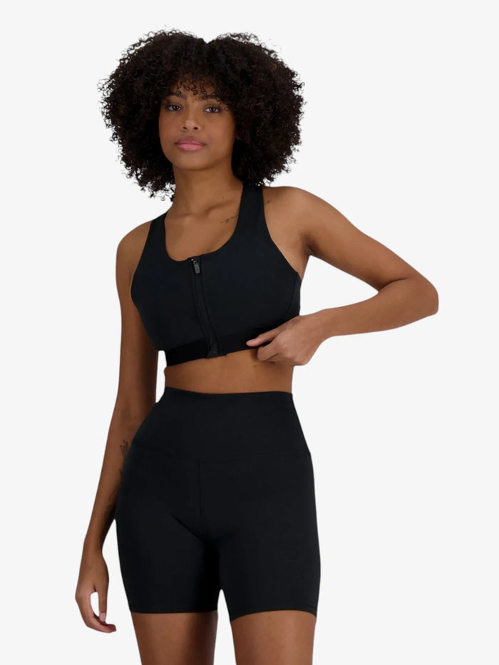 Top Deportivo New Balance Mujer NB Sleek Medium Support Pocket Zip Training