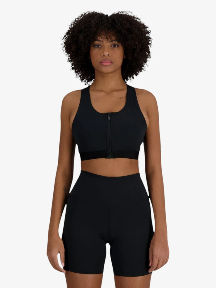 Top Deportivo New Balance Mujer NB Sleek Medium Support Pocket Zip Training