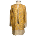Long sleeve tunic shirt in grey and mustard paisley. Tassel tie at neck